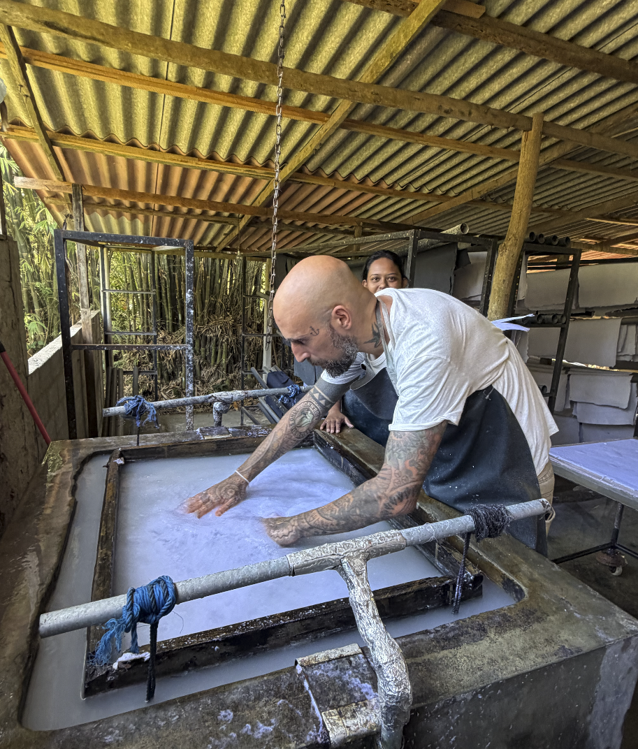 Visitors learning papermaking at the Kadadasi workshop
